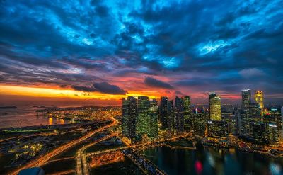 sunset over timelapse busy city