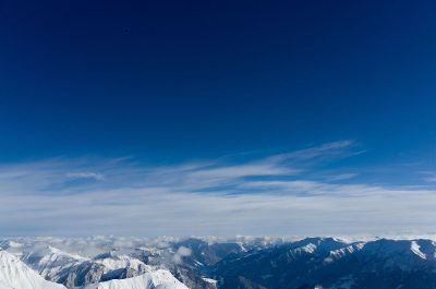 white snowy mountains against blue sky