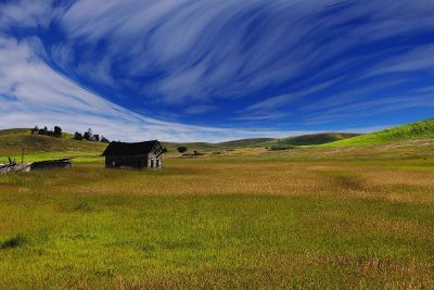 blue sky over farmland