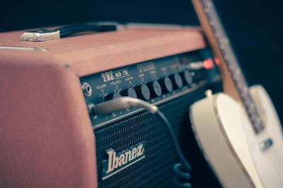 guitar plugged into an amplifier