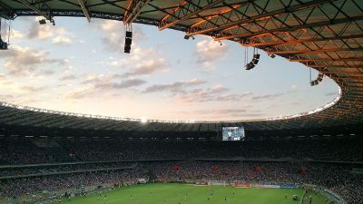 stadium with crowd and athletes