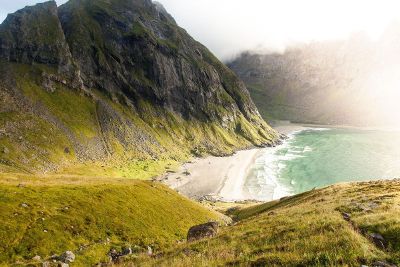 private beach by mountains