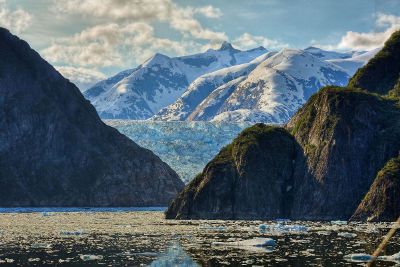 glacier surrounded by mountains