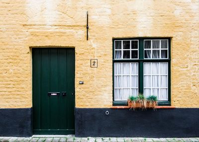 brick building with green trim