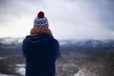 person looking at mountains