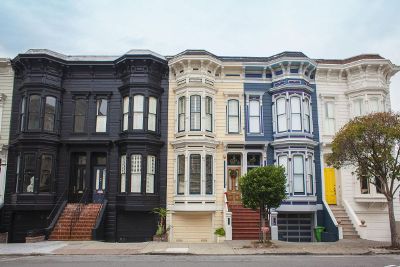 multicolored homes with staircase entrance