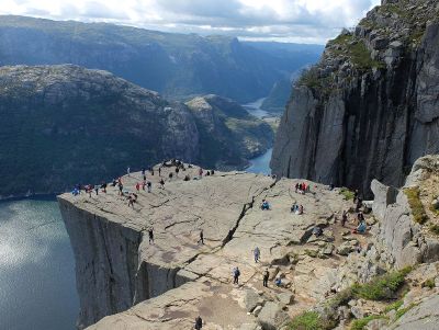 tourists on a cliff