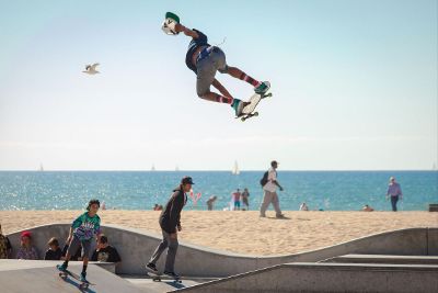 skate boarding at the beach