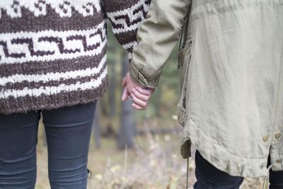 boy and girl holding hands