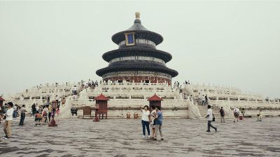 tourists in front of monument