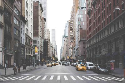 busy street with buildings and cars