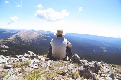 man looking at the world