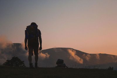 backpacker at sunset