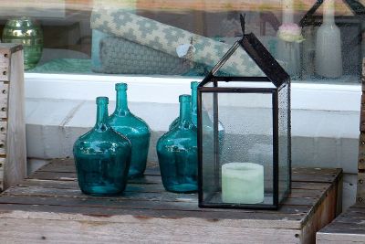 jars and candle on table