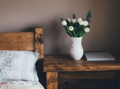 white tulips in a white vase