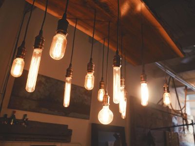 incandescent bulbs hanging from wood