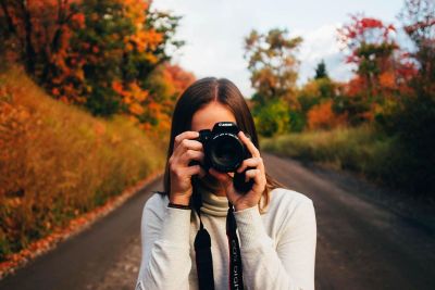 woman using camera