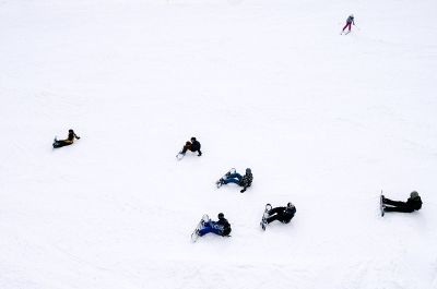group of snowboarders on a slope