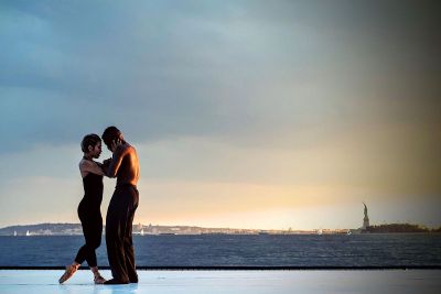 couple dancing by the water