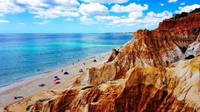 beautiful beach behind rocks