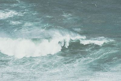 waves crashing in the ocean