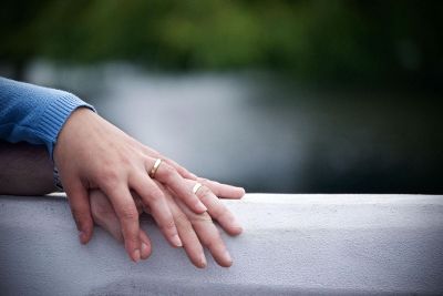 couples hands with rings