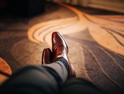 dress shoes and polka dotted socks