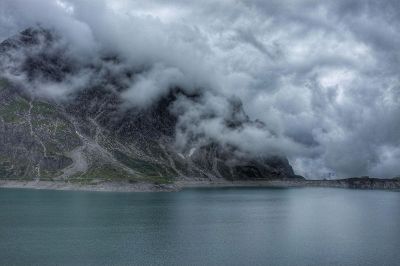 cloudy mountain with lake