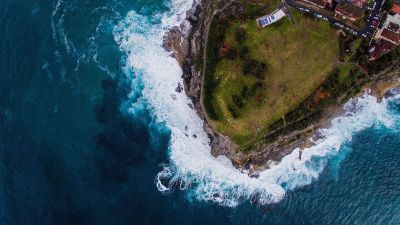 aerial view of city by ocean