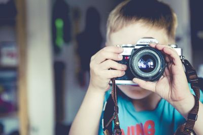 kid taking picture