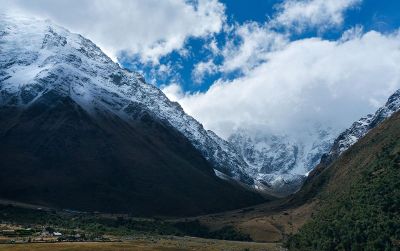 town in valley between snowy mountains