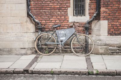 bicycle against brick wall