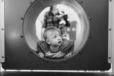 boy at playground with mom