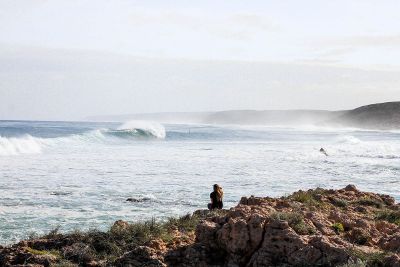 person watching the ocean