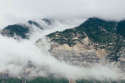 fog rolls over mountains