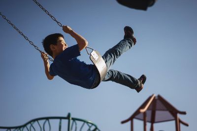 boy swinging