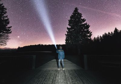 man looking at the stars