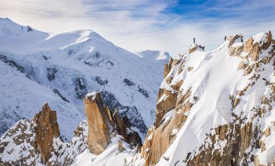 climbers on snowy peak