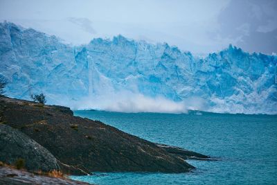 chunk of ice breaking off glacier