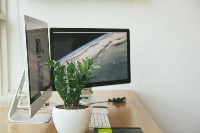 computer desk with monitors