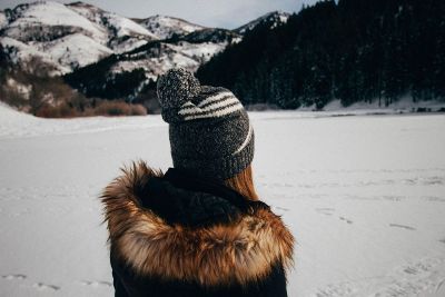 woman and snowy mountain