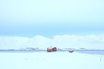 lonely home in the winter mountains