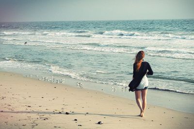 girl walking on beach