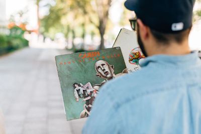 man looking at records