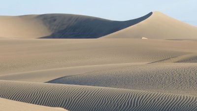 sweeping tan sand dunes