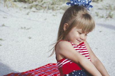 little girl playing on the beach