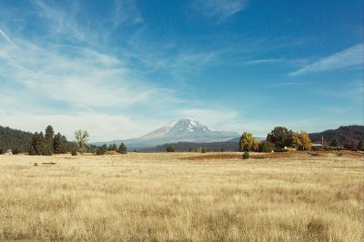 mountain over plain in distance