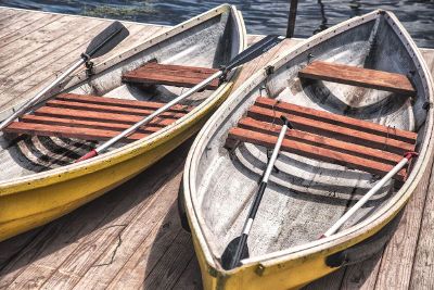 two rowboats on a dock