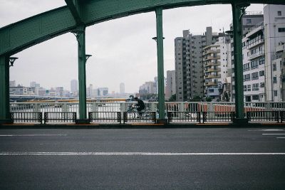 bike rider on bridge