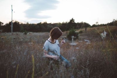 woman walking in prairie